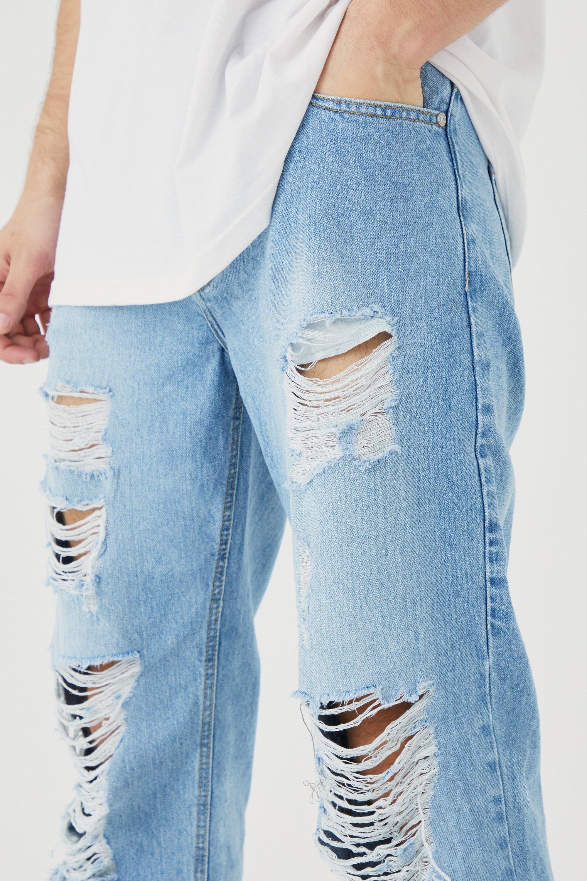 Relaxed Rigid Extreme Ripped Jeans | boohoo